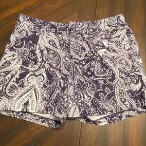 Women’s size 10 I-N-C navy blue and white shorts.